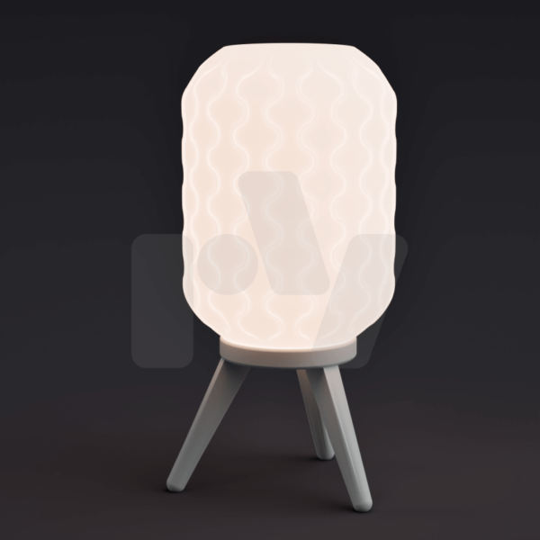 Sculpted Shade Lamp by Ray Decore with a wavy textured light shade on a tripod stand, glowing warmly against a dark background.