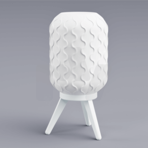 Sculpted Shade Lamp by Ray Decore with a wavy textured light shade on a tripod stand, turned off and placed on a surface.